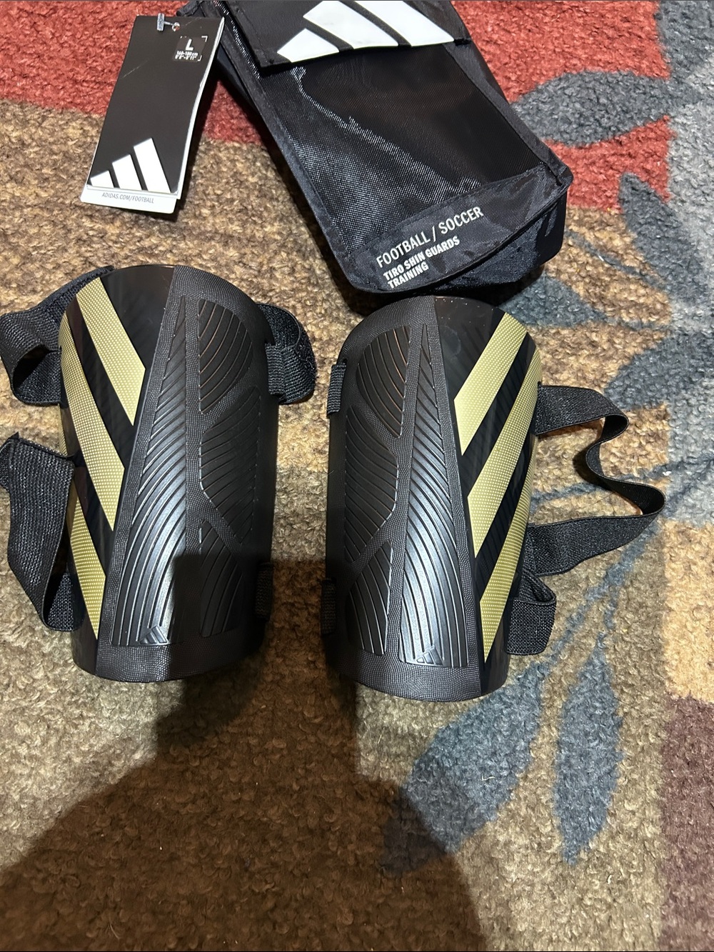 adidas Black and Gold Soccer Shin Guards with Straps